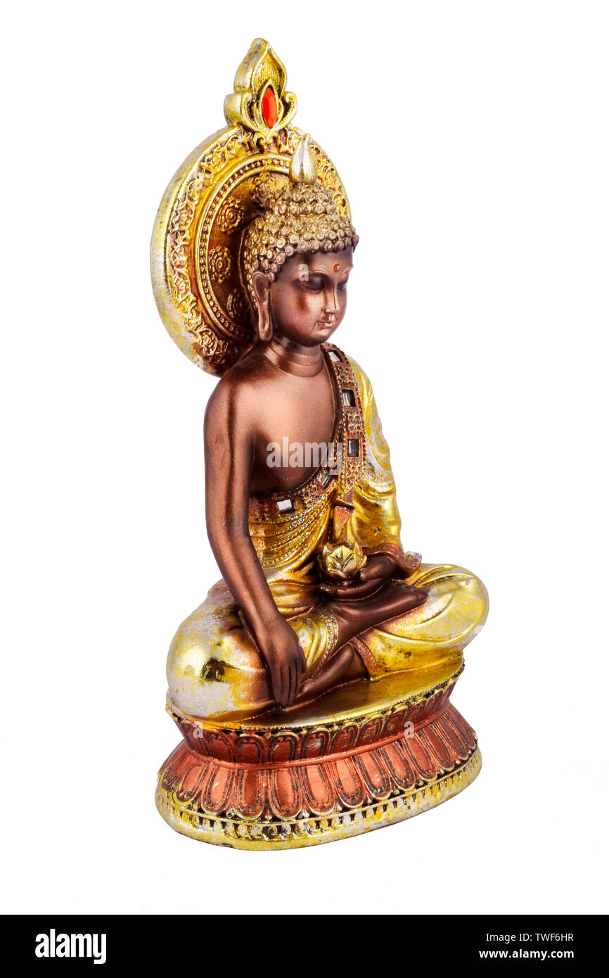buddha statue isolated on white background, brown brass buddha statue. Stock Photo