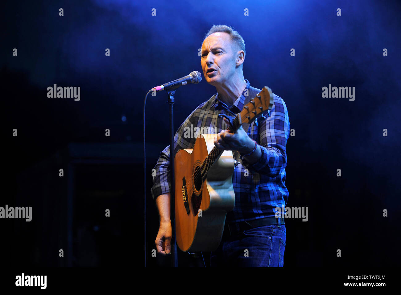 Former Aztec Camera musician Roddy Frame performs a solo acoustic set at the Kelvingrove Bandstand, Glasgow Stock Photo