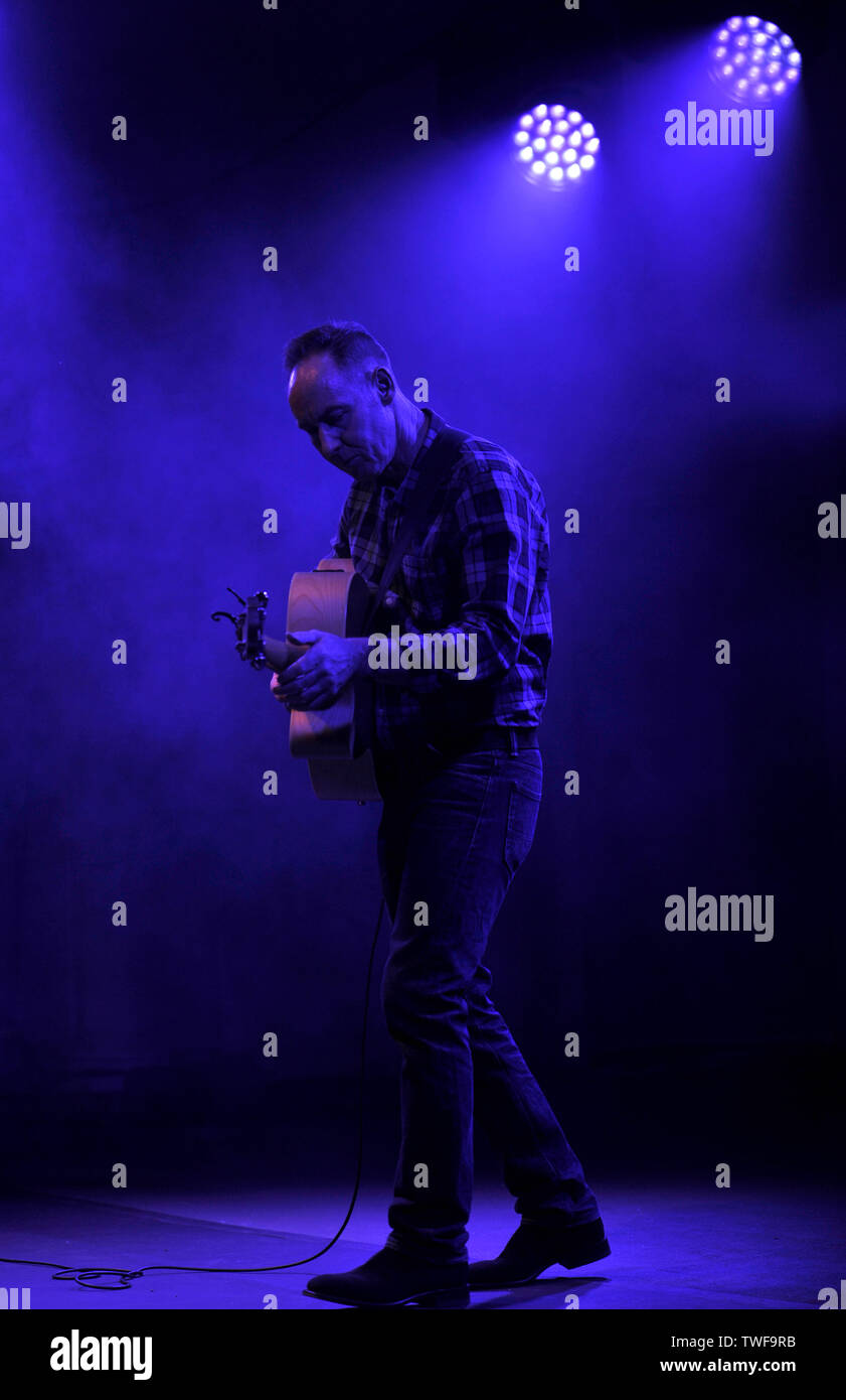 Former Aztec Camera musician Roddy Frame performs a solo acoustic set at the Kelvingrove Bandstand, Glasgow Stock Photo