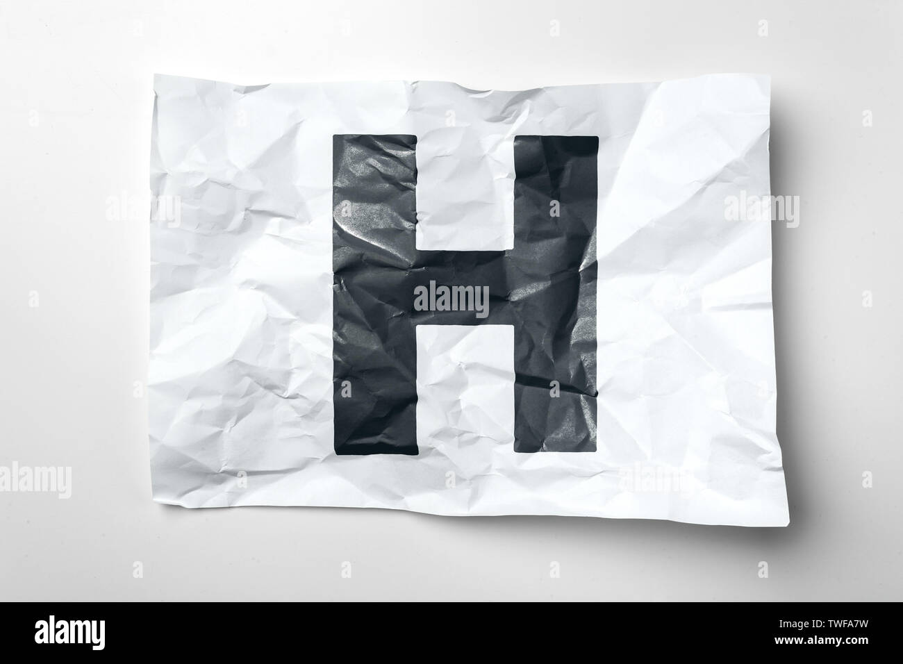 Grunge wrinkled paper letters on white background Stock Photo - Alamy