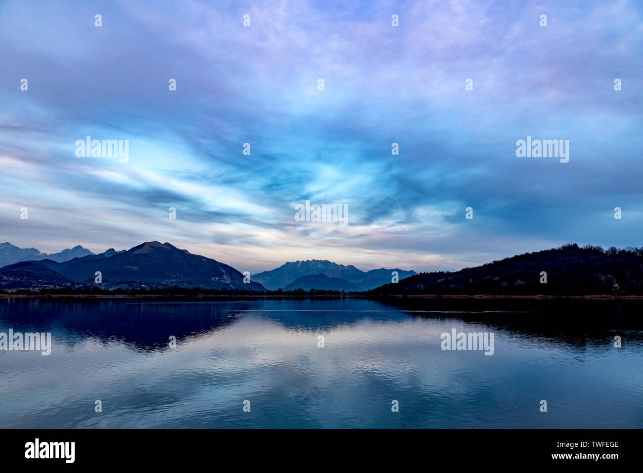 Alserio lake and mountains Stock Photo