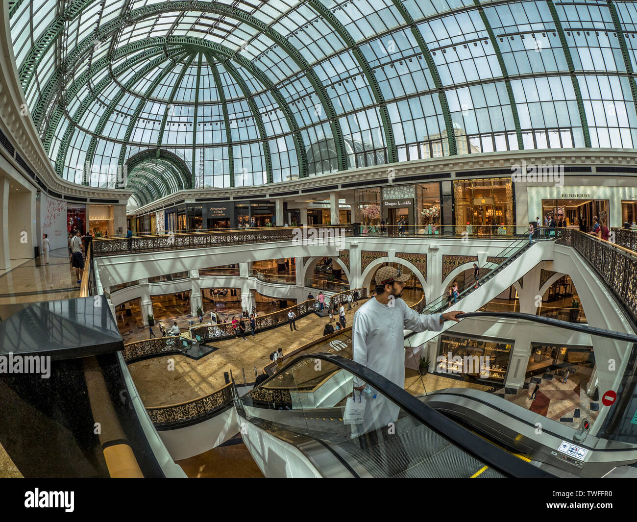 Shoppers pass through the elegant Mall of the Emirates in Dubai. Stock Photo