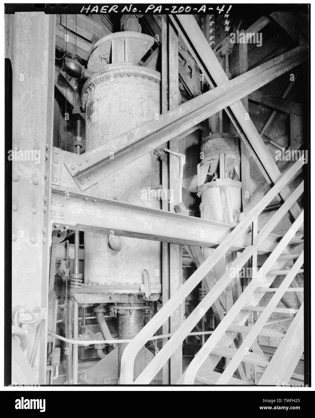 PNEUMATIC CYLINDERS THAT RAISED AND LOWERED THE SMALL AND LARGE BELLS WITHIN THE ROTARY DISTRIBUTER OF CARRIE FURNACE No. 6. - U.S. Steel Homestead Works, Blast Furnace Plant, Along Monongahela River, Homestead, Allegheny County, PA; U.S. Steel Corporation; Brown, James S; Clark, E L; Fownes, H C; Fownes, W C; Brown Hoisting Machinery Company; Massicks and Crooke; Pollock Company; Westinghouse Electric Company; Wilson-Snyder; Allis-Chalmers Company; Keystone Bridge Company; Riley-Stoker; Ingersoll-Rand; S. P. Kinney; Research-Cottrell, Incorporated; Worthington [pump manufacturer]; American Br Stock Photo