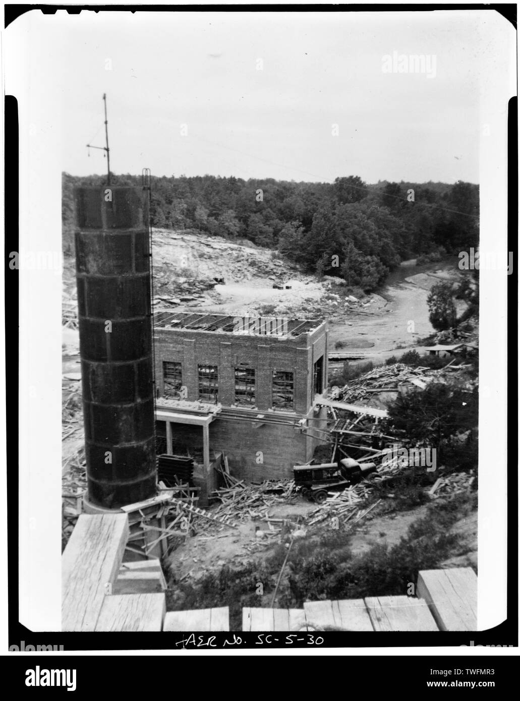POWER PLANT NEARLY COMPLETE, SURGE TANK ON LEFT - Abbeville Hydroelectric Power Plant, State Highway 284 and County Road 72, Rocky River (historical), Abbeville County, SC; Abbeville Water and Electric Plant Company; Pennell, James Roy; White, W H; Abbeville Power Company Incorporated; D.M. Rickenbacker Construction Company; Townsend, C P; Wideman and Singleton; Britton, John B; S. Morgan Smith Company; Woodward Governor Company; Bethlehem Steel Company; Westinghouse Corporation; Bush Sulzer Brothers Company; Mark Brothers; Cary, Brian, transmitter Stock Photo
