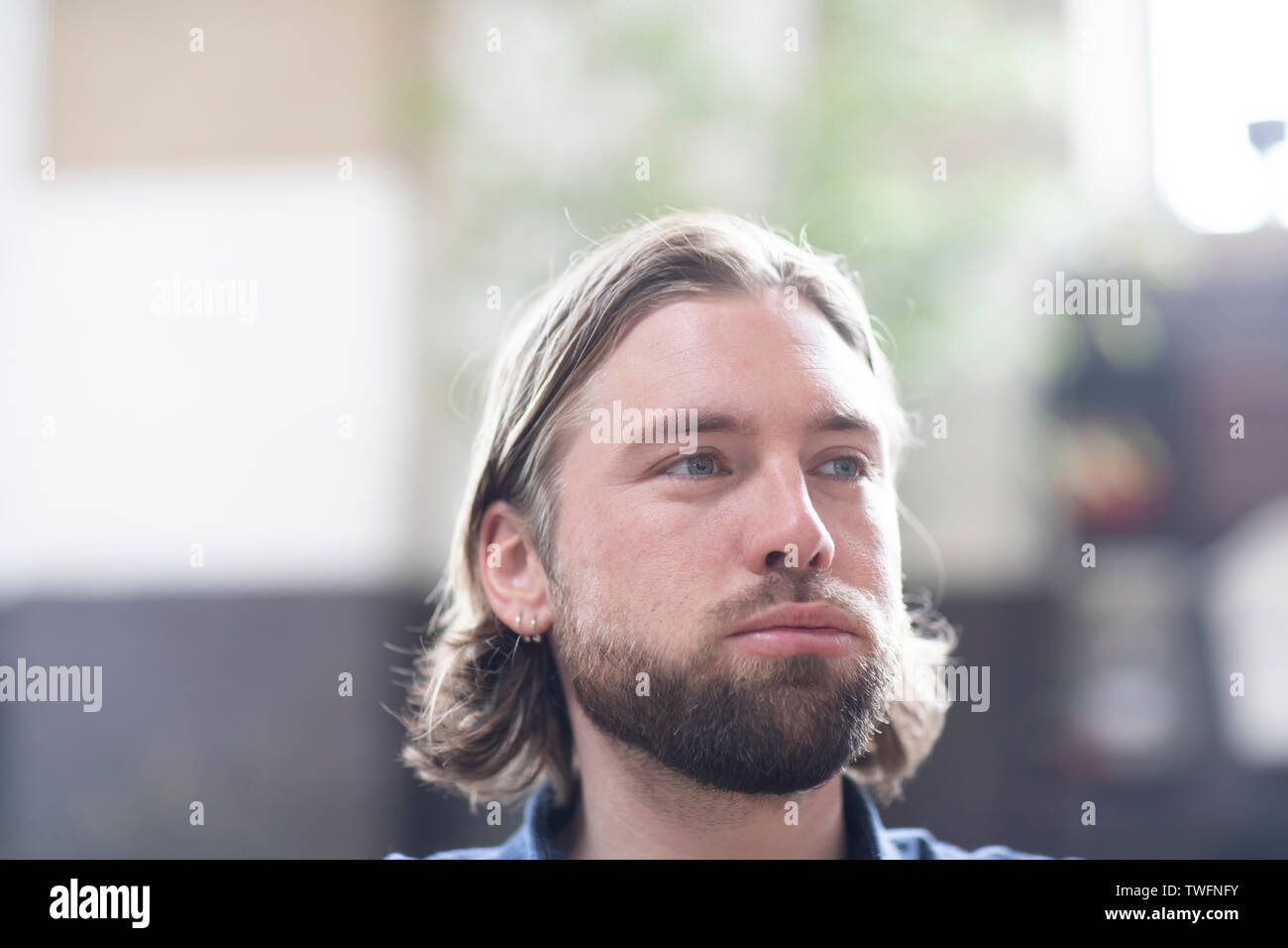 Portrait of a man pursing his lips Stock Photo