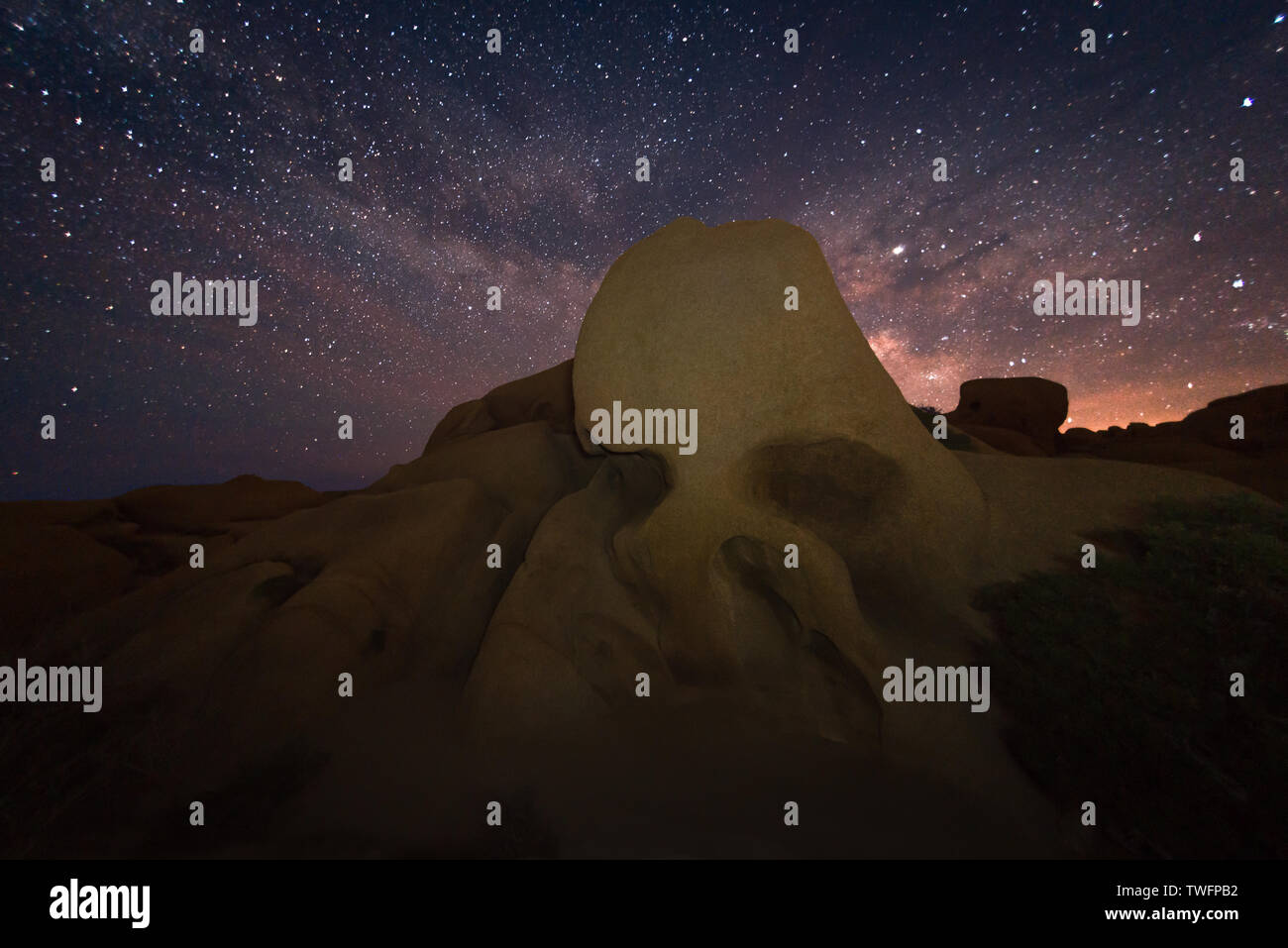 Skull Rock against the night sky, Joshua Tree National Park, California, United States Stock Photo