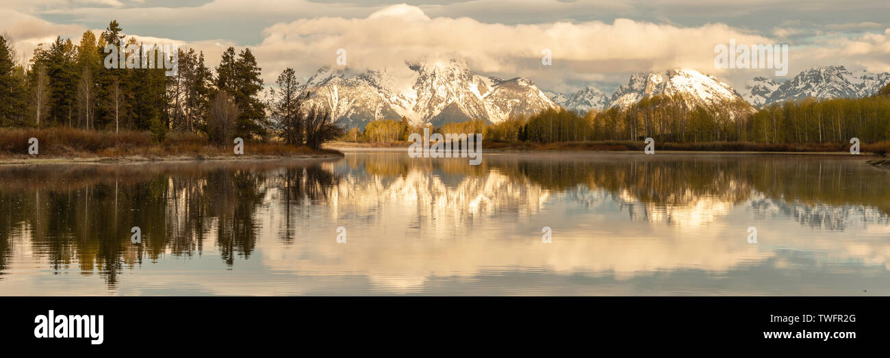 Mount Moran and Aspen trees from Ox Bow Bend on Snake River, Grand Teton National Park, Wyoming, USA Stock Photo