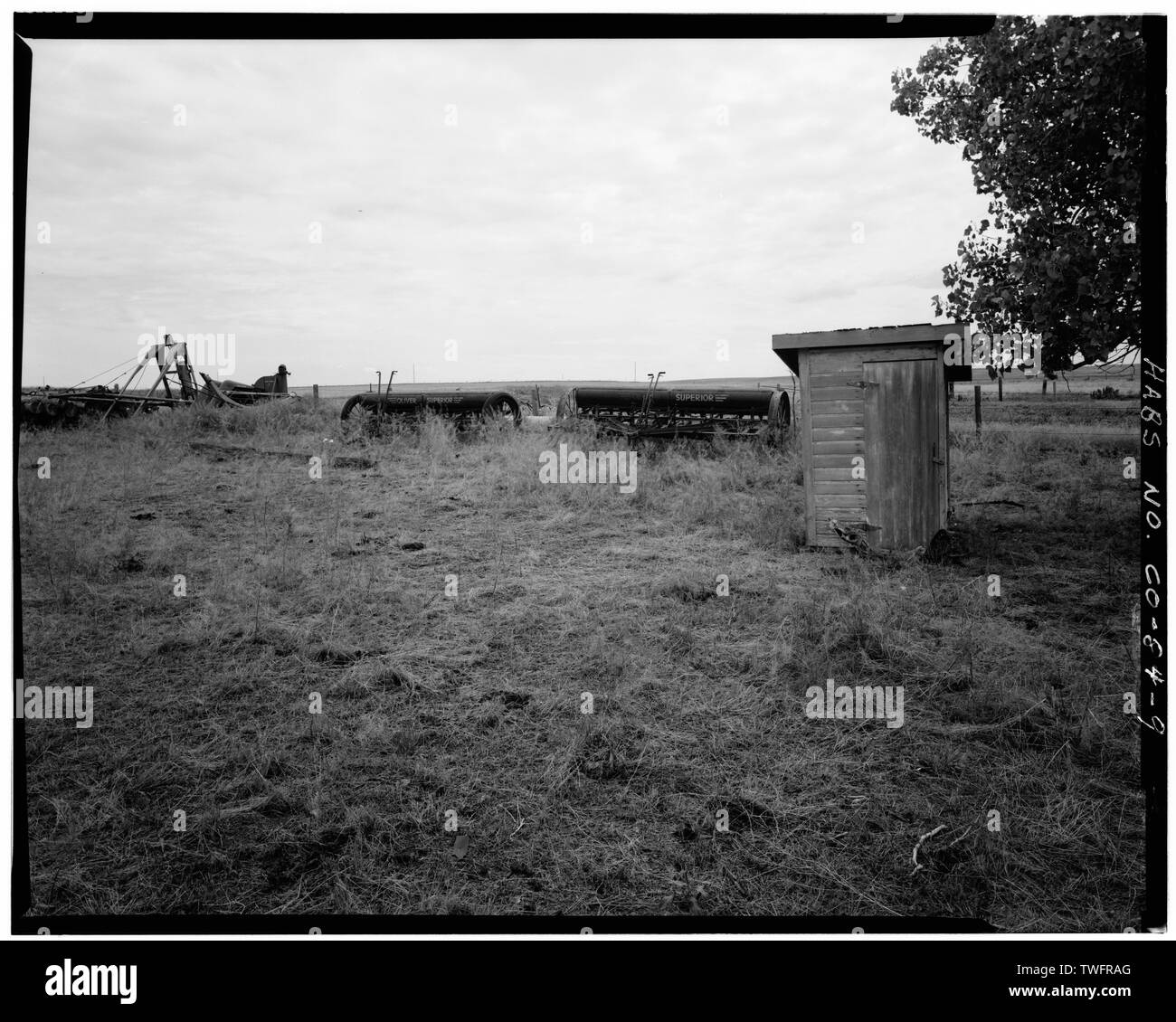 PRIVY AND FARM EQUIPMENT South - Windler Farm, Vicinity of East Forty-eighth Avenue and Picadilly Road, Aurora, Adams County, CO Stock Photo