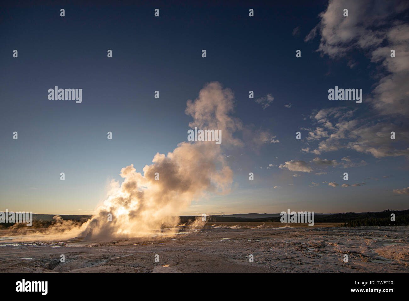 Sunset behind Clepsydra Geyser, a Fountain Group Geyser, Yellowstone National Park Stock Photo