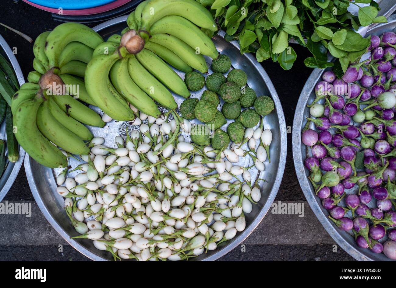 Overhead view of bananas, brinjals and bergamot, Thailand Stock Photo