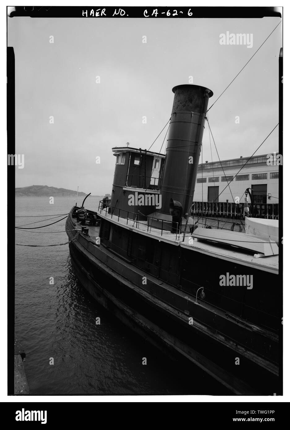 Port side of cabin showing stack and wheelhouse, looking forward. - Steam Tug HERCULES, Hyde Street Pier, San Francisco, San Francisco County, CA Stock Photo