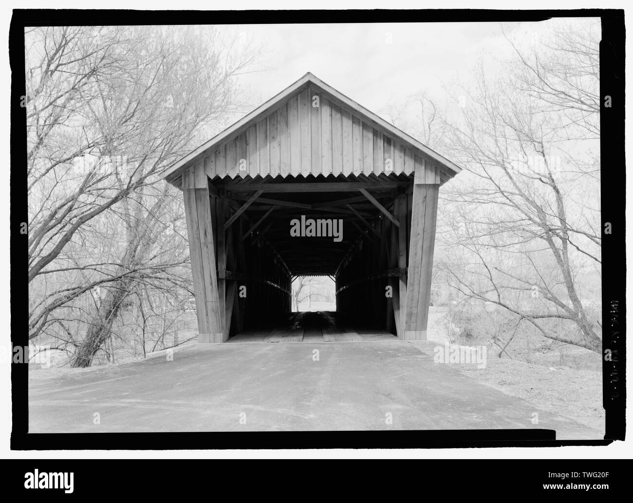 Portal elevation. - Bennett's Mill Bridge, Spanning Tygart's Creek, East Tygart's Creek Road (CR 1215), Lynn, Greenup County, KY; Bennett, B F; Reid, A L; Wheeler, Isaac Hastings; Wheeler, William; McGee, E A; Darlington, Joseph; Darlington, Gabriel; Bennett, William  P; Bennett, Benjamin  F; Federal Highway Association; Bower Bridge Company; Bower, Louis; Intech Contracting; Marston, Christopher, project manager; Christianson, Justine, transmitter; Federal Highway Administration, sponsor Stock Photo