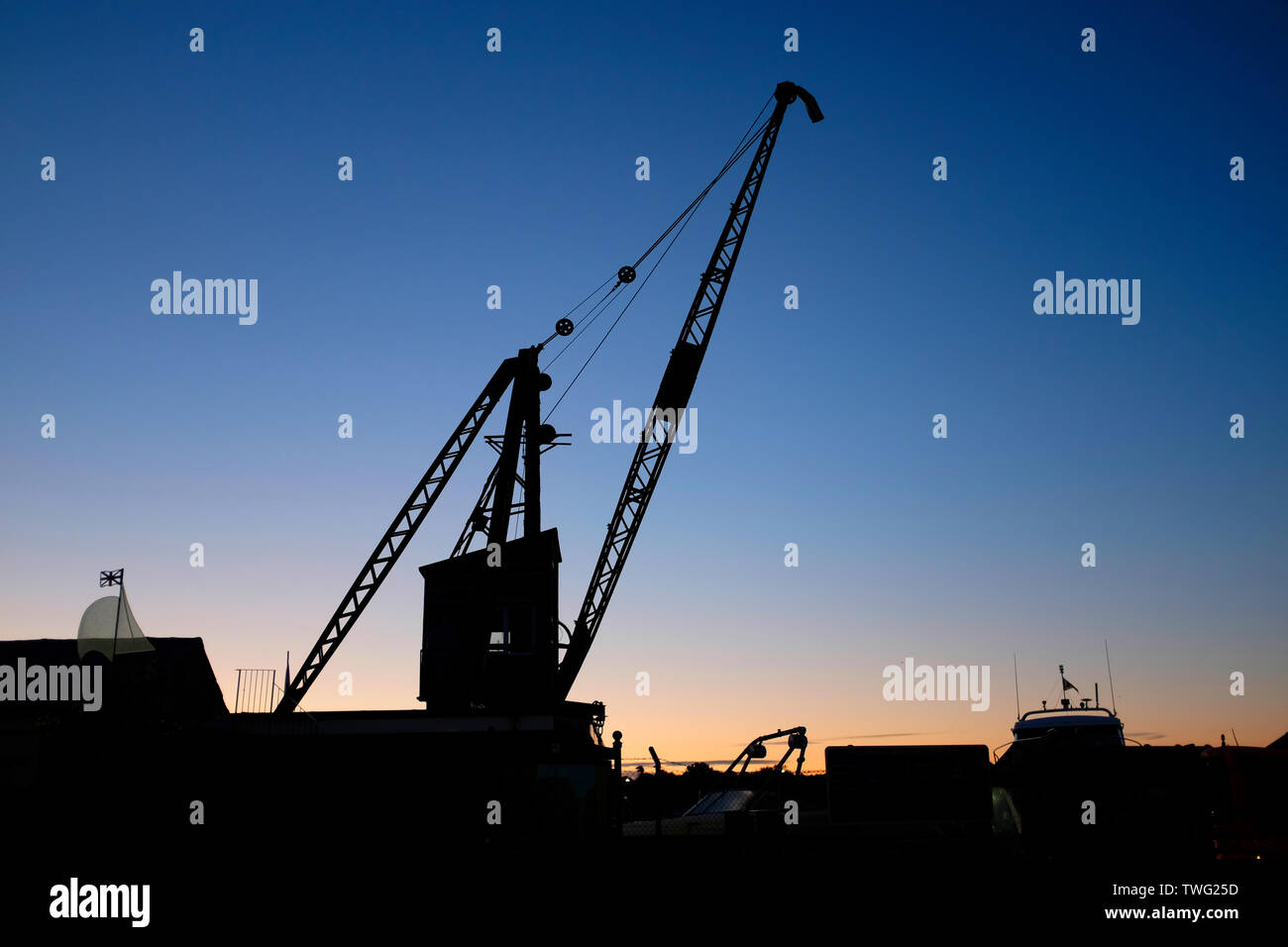 harbor,boom,Crane,silhouette,Thetis,wharf,dock,boat,yard,dawn,sunrise,Cowes,Isle of Wight, Stock Photo