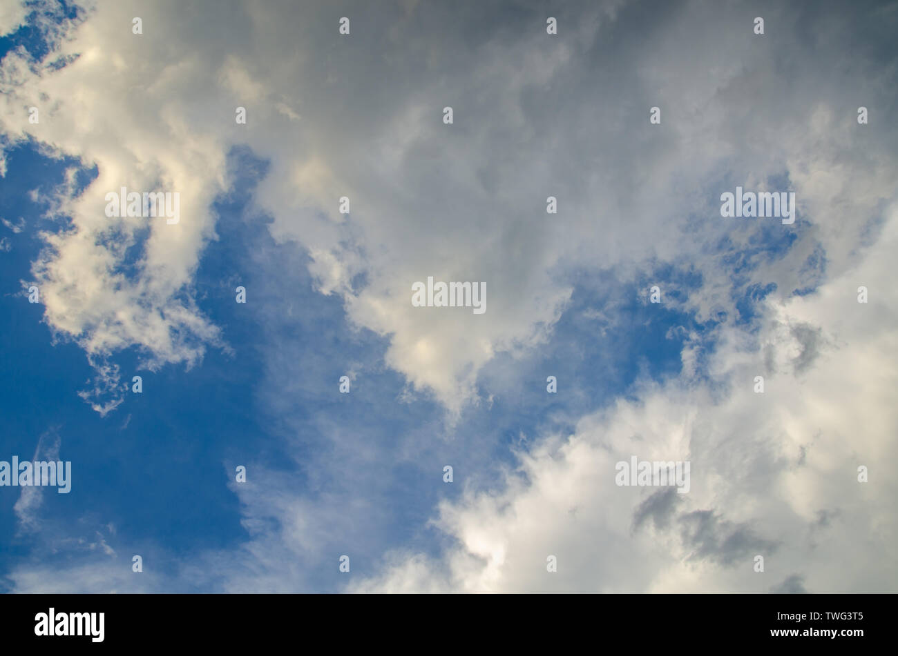 Blue sky background with gray clouds Stock Photo
