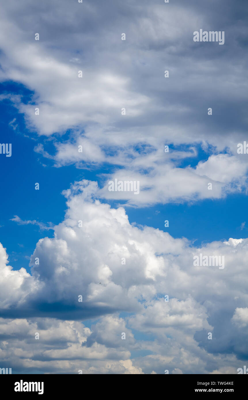 Blue sky background with white abstract clouds Stock Photo