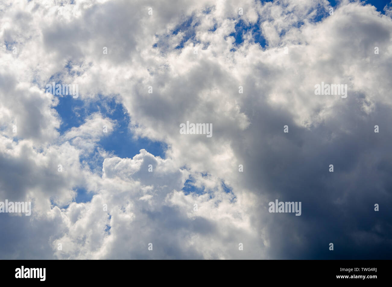 Blue sky background with gray clouds Stock Photo