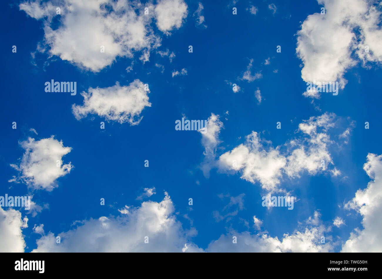 Blue sky background with white abstract clouds Stock Photo - Alamy