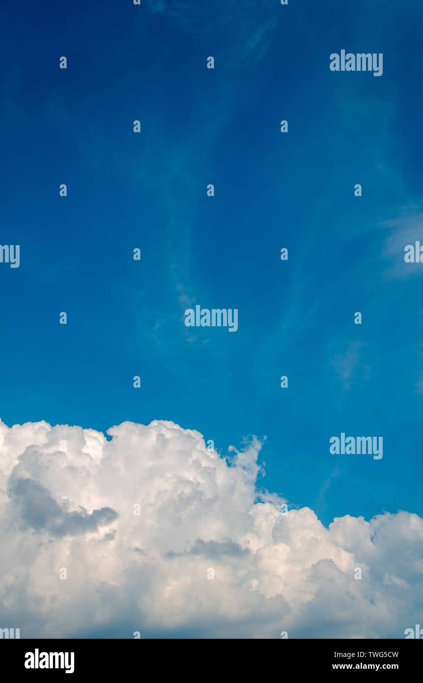 Blue sky background with white cumulus clouds Stock Photo - Alamy