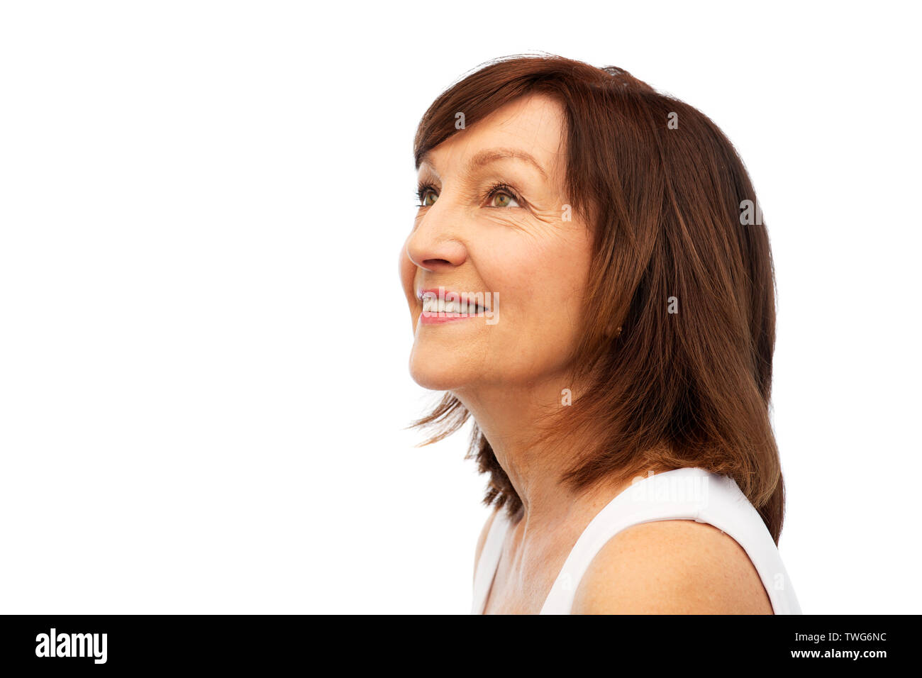 portrait of smiling senior woman over white Stock Photo