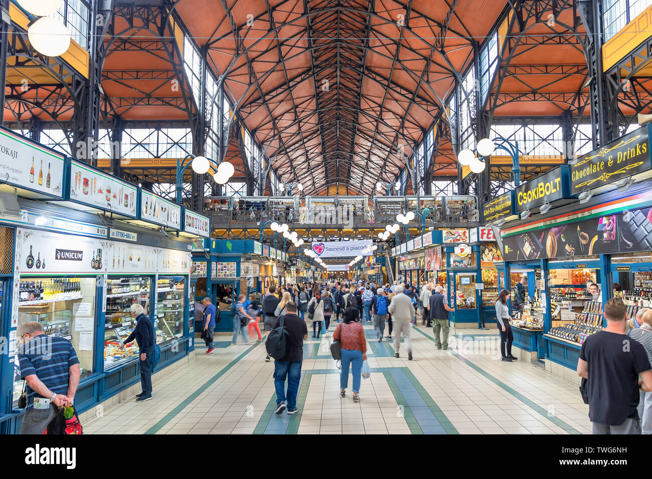 People shopping in the Great Market Hall in Budapest, Hungary. Great Market Hall is the largest indoor market in Bu Stock Photo