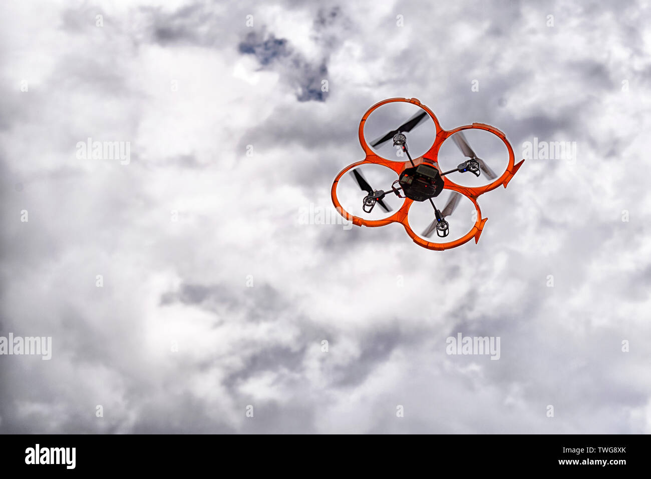 Drone on the clouded sky Stock Photo