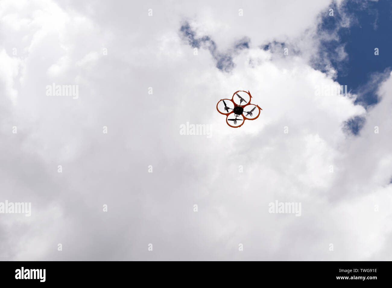 Drone on the clouded sky Stock Photo