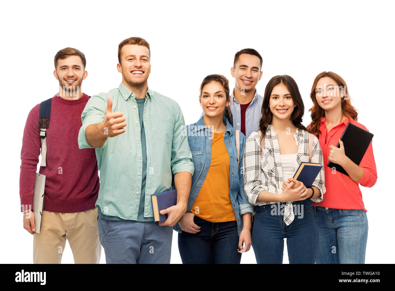 group of smiling students showing thumbs up Stock Photo - Alamy