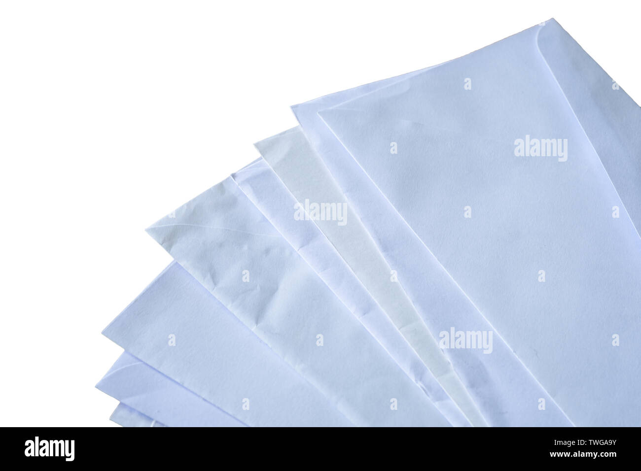 Documents and envelopes stacked on white background Stock Photo