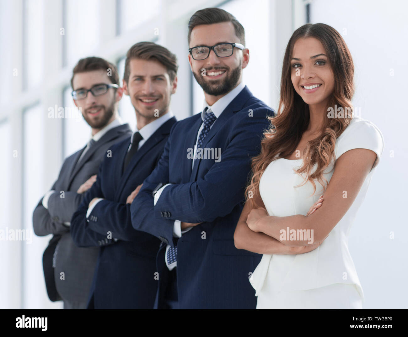 successful business team standing in a bright office Stock Photo - Alamy