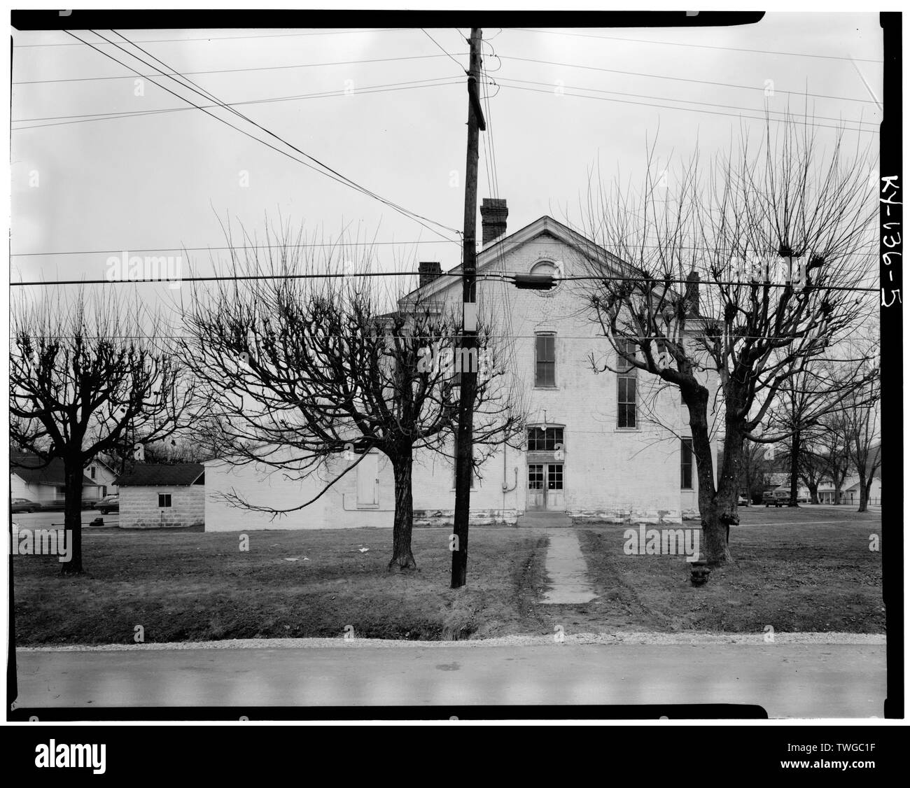 REAR ELEVATION, PHOTO TAKEN FROM SIDEWALK, SHOWING ADDITIONS Powell