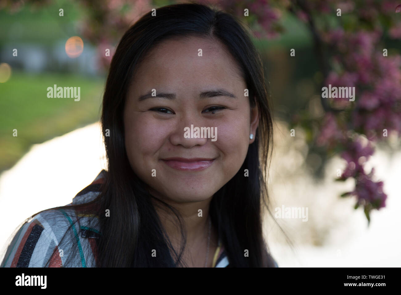 A beautiful teenage girl smiles for the camera in Fort Wayne, Indiana, USA. Stock Photo