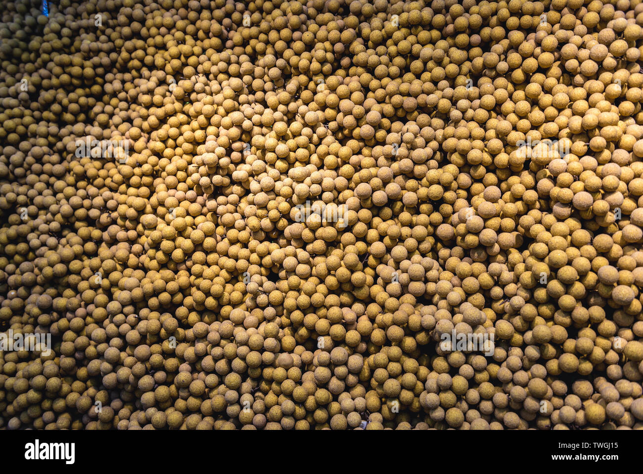 Longan fruits also known as dragon eyes in shop in Beijing, capital city of China Stock Photo