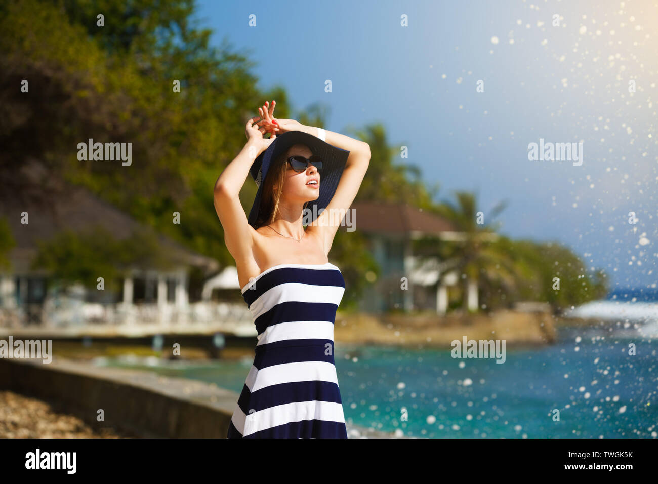 Young Women In Straw Hat And Stylish Beach Enjoying The Tropical Sun Summer Skin Care Concept Pretty Girl On Vacation At The Island Near Ocean Stock Photo Alamy