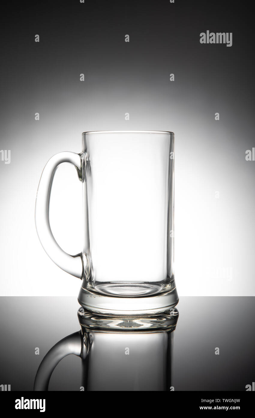 Empty clear beer mug, isolated on white background. Stock Photo