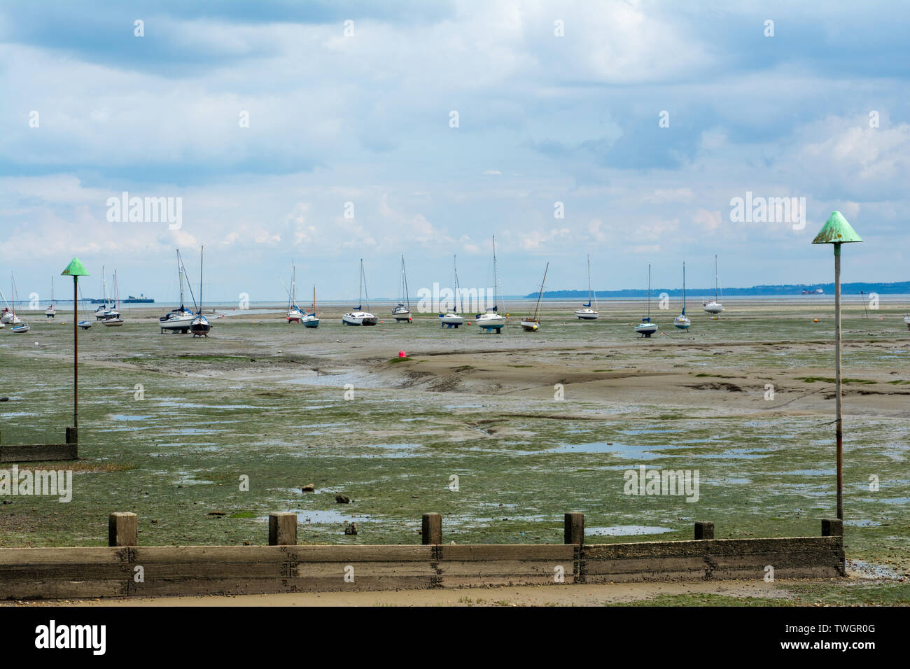 leigh, Essex, UK, 2019-05-28, Coastal fishing village with yachts and fishing boats securely moored whilst tide is out. Stock Photo