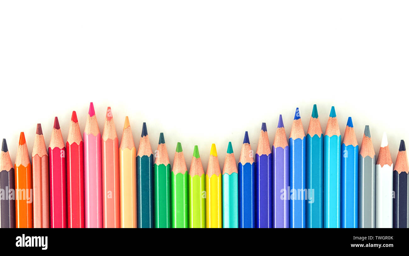 Closeup Of Coloured Pencils Lined Up In A Row On White Background Copy Space Stock Photo Alamy