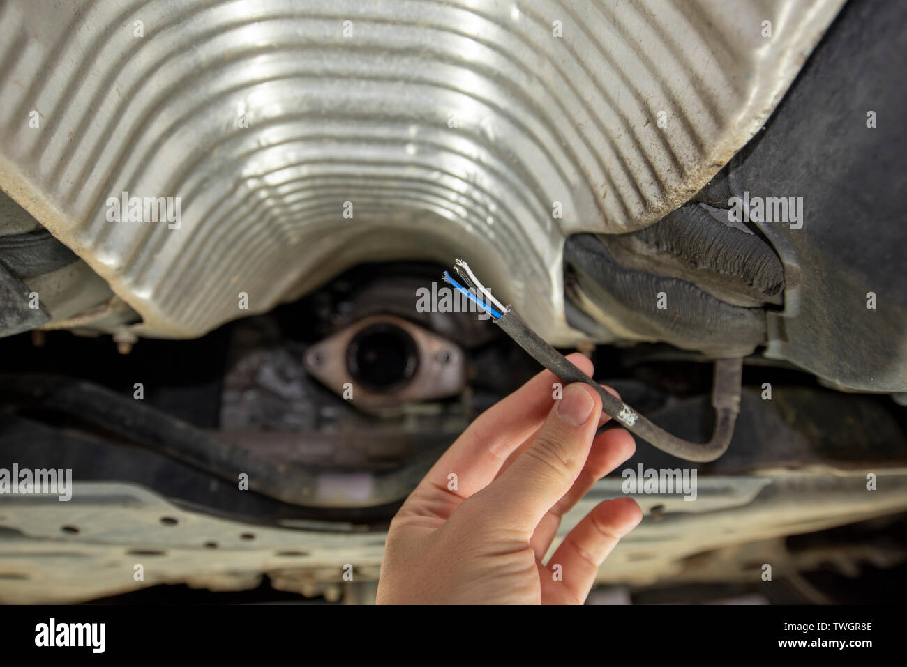 Toyota Prius, stolen Catalytic Converter. View underneath vehicle from