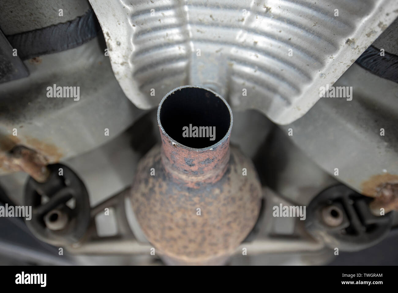 Toyota Prius, stolen Catalytic Converter. View underneath vehicle from a  mechanics inspection pit, showing location of missing and damaged components  Stock Photo - Alamy