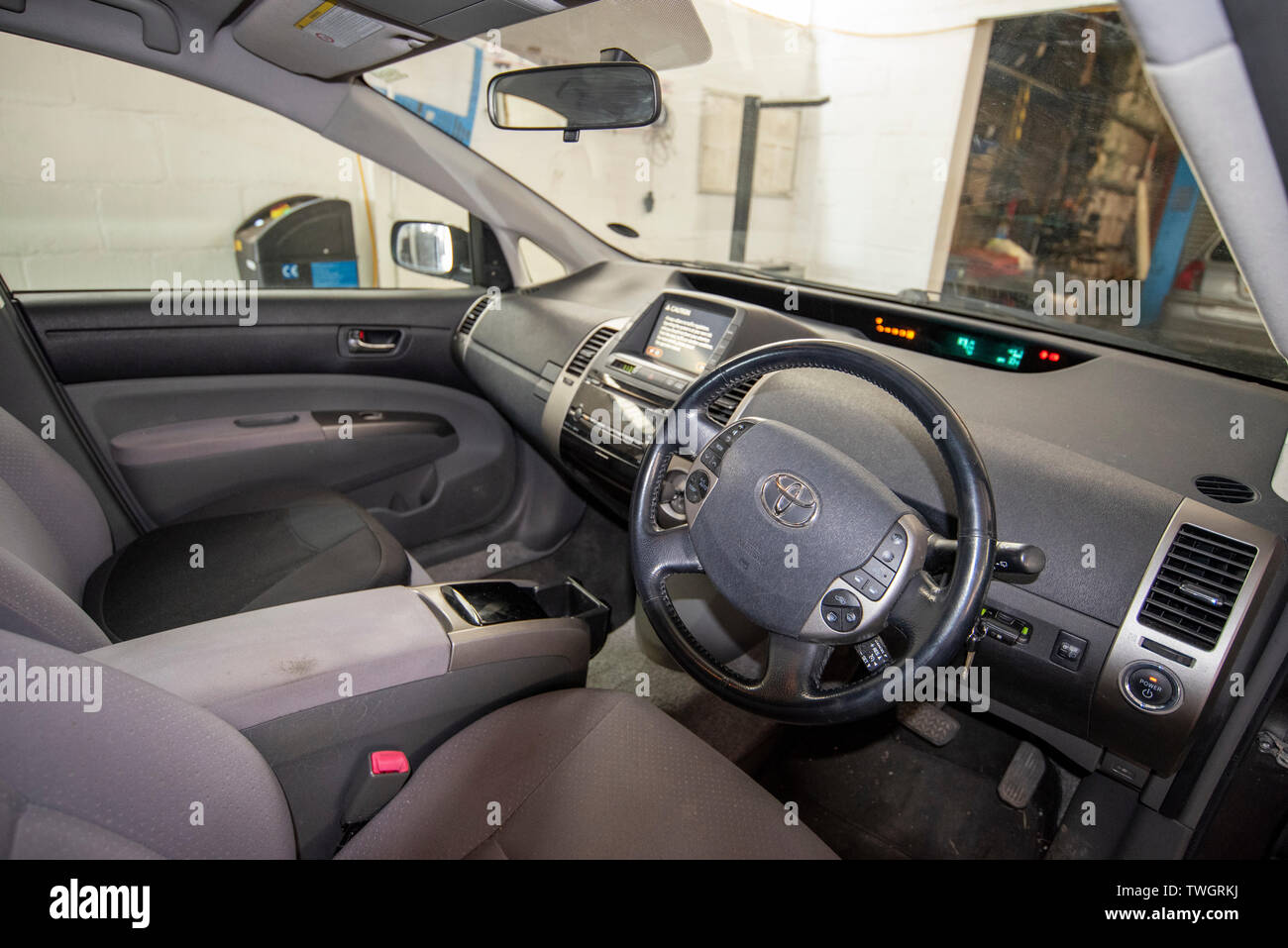 Toyota Prius, stolen Catalytic Converter. Inside vehicle. Stock Photo