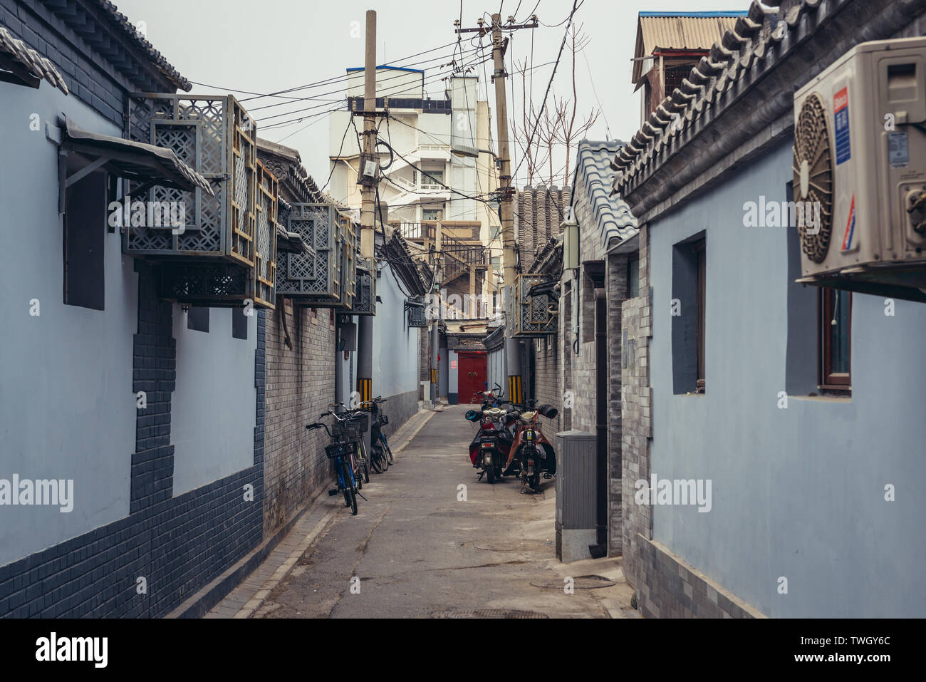 Narrow alley called hutong - traditional residential area in Dongcheng district of Beijing, China Stock Photo