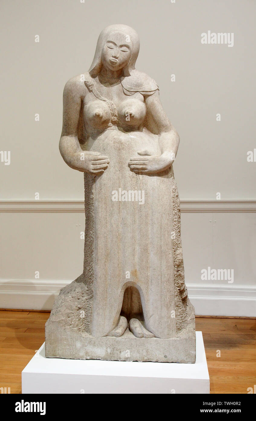 Maternity - a statue carved out of Hopton Wood stone, by Jocob Epstein. Photographed in Leeds Art Gallery, Yorkshire, England, UK. Stock Photo