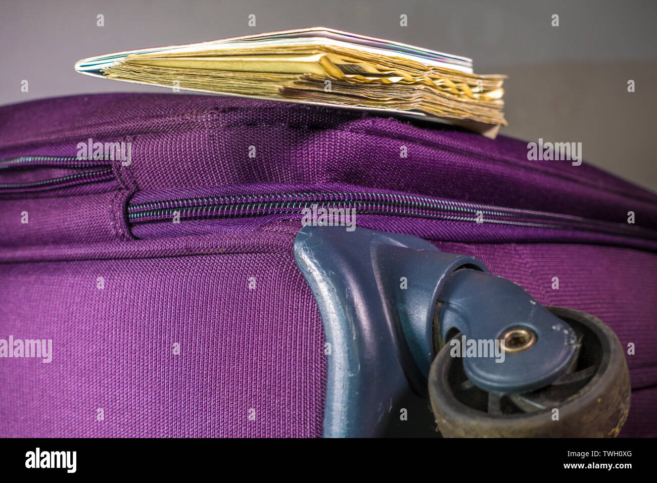 on a wooden board bag full of money Stock Photo - Alamy