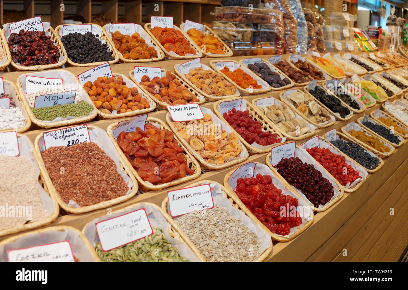 Dried fruits, beans and nuts on street market  shelf Stock Photo