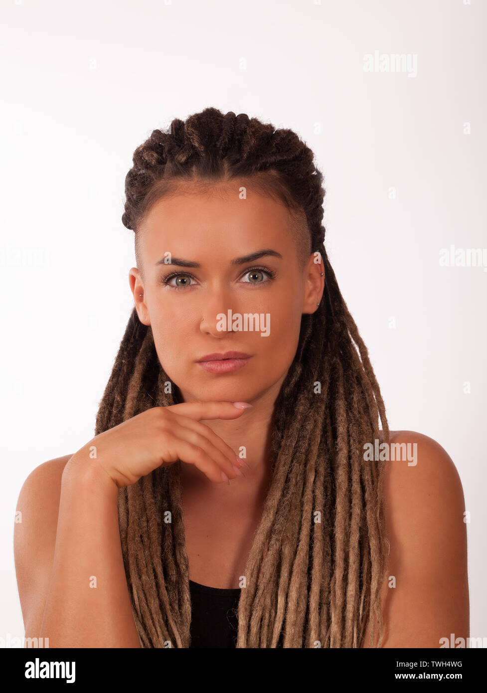 Portrait Of A European Girl With African Braids And Shaved Temples