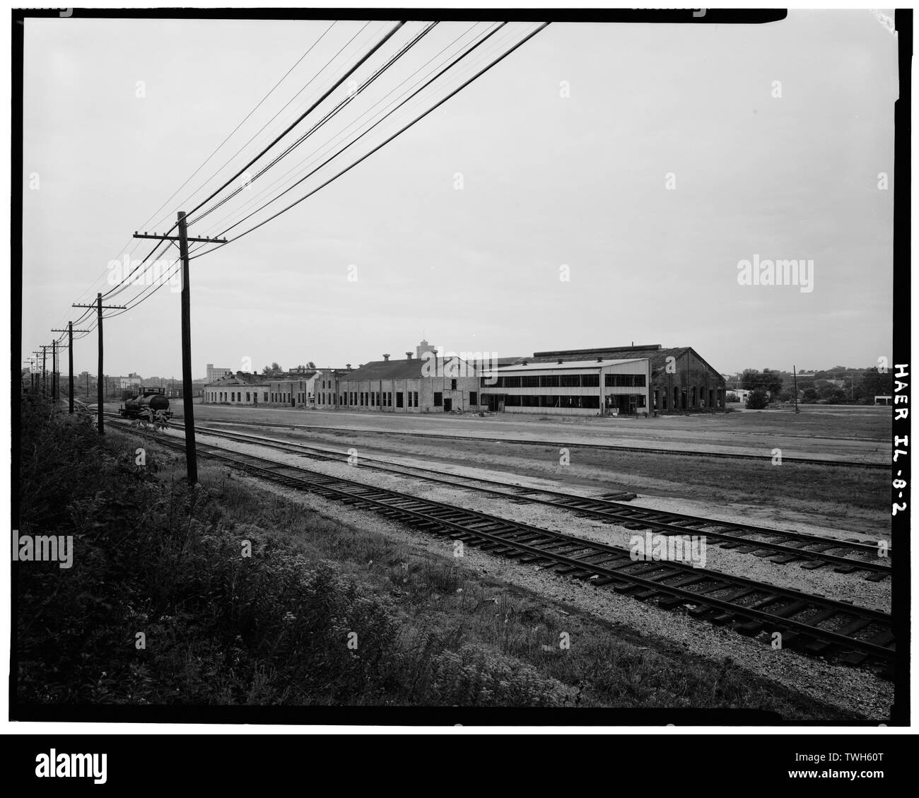 Roadhouse and shops, from Chicago, Burlington and Quincy Railroad mainline, facing southeast. - Chicago, Burlington and Quincy Railroad, Roundhouse and Shops, Broadway and Spring Streets, Aurora, Kane County, IL Stock Photo