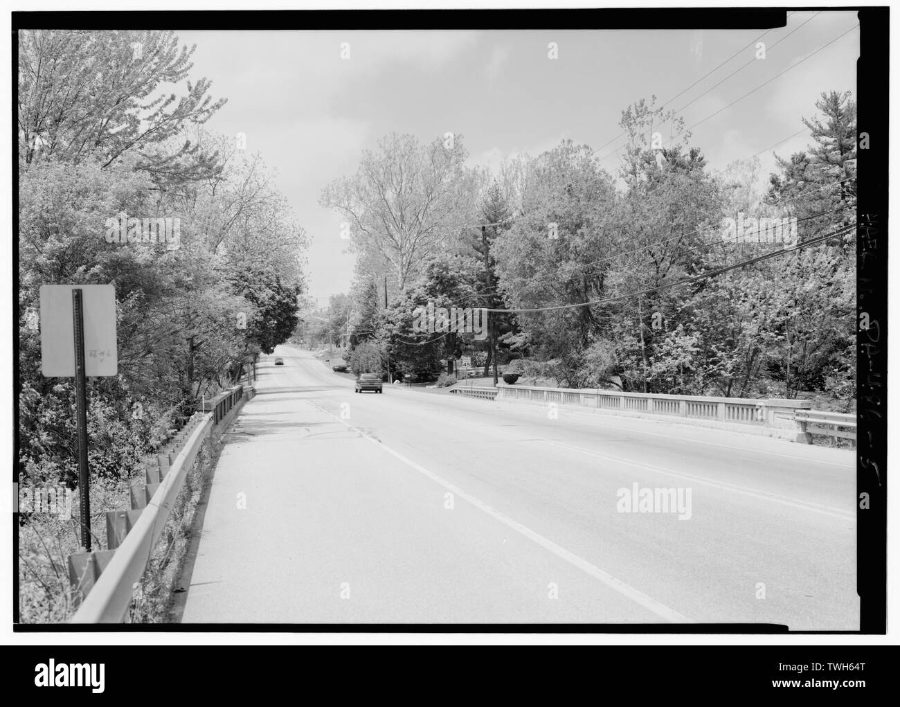 Roadway from eastern portal, looking west. - Little Conewago Creek Bridge, Spanning South Branch of Conewago Creek at Lincoln Highway (U.S. Route 30), New Oxford, Adams County, PA; Williams, Charles A; Wagman, George A; Wagman, Fred M; Pennsylvania Department of Highways; DeLony, Eric N, project manager; Pennsylvania Department of Transportation, sponsor; Pennsylvania Historical and Museum Commission, sponsor; Hawley, Haven, historian; Lowe, Jet, photographer Stock Photo