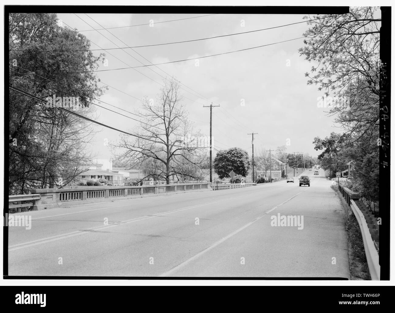 Roadway from western portal, looking east toward downtown New Oxford. - Little Conewago Creek Bridge, Spanning South Branch of Conewago Creek at Lincoln Highway (U.S. Route 30), New Oxford, Adams County, PA; Williams, Charles A; Wagman, George A; Wagman, Fred M; Pennsylvania Department of Highways; DeLony, Eric N, project manager; Pennsylvania Department of Transportation, sponsor; Pennsylvania Historical and Museum Commission, sponsor; Hawley, Haven, historian; Lowe, Jet, photographer Stock Photo