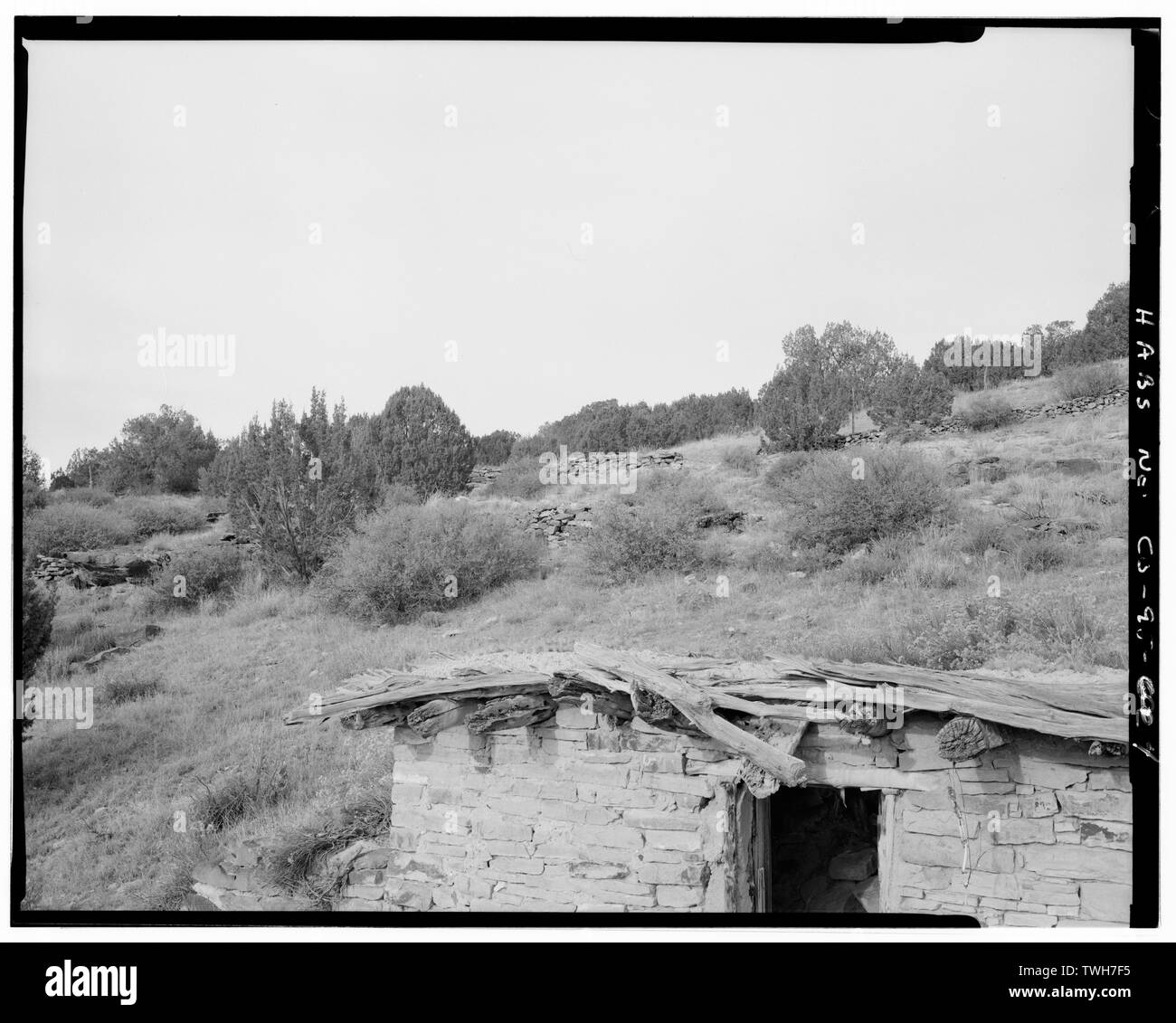 Rock retaining walls on west hillside, looking northwest. - Mary Doyle Homestead, 12 miles east of U.S. Highway 350, Model, Las Animas County, CO Stock Photo