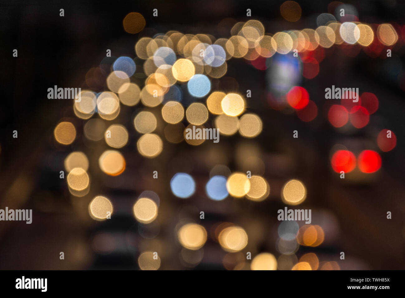 Out of focus car traffic, in Sao Paulo, Brazil. Mainly the lights are red, white, blue and yellow. Stock Photo