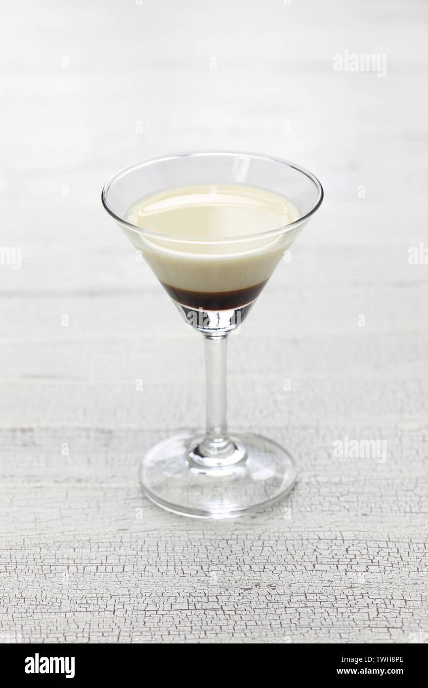 black and white, two color layered cocktail, homemade coffee liqueur and evaporated milk, alfonso13 Stock Photo